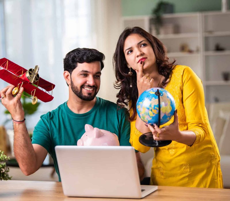 indian-young-couple-planning-a-vacation-with-lapto-2025-01-16-12-55-57-utc