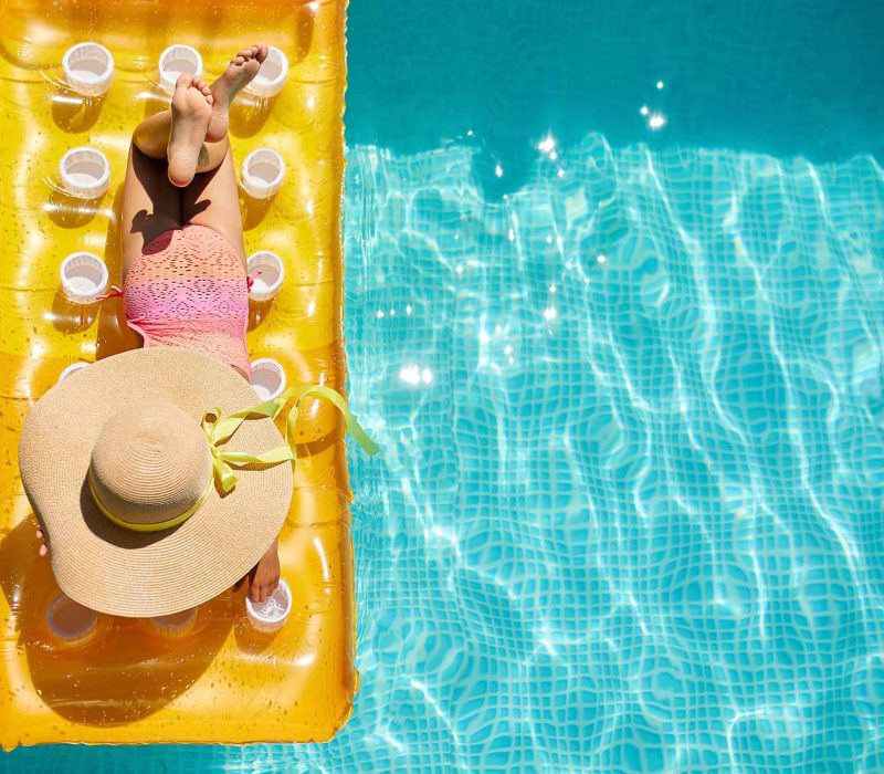 top-view-little-girl-in-hat-relaxing-in-swimming-p-2025-01-08-04-05-38-utc